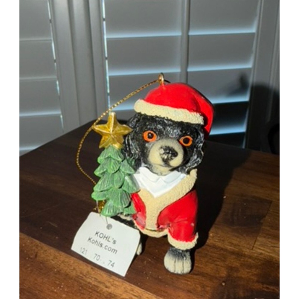 Kohls Christmas Ornament Black Dog in Santa Suit Holding Tree Holiday Decor
